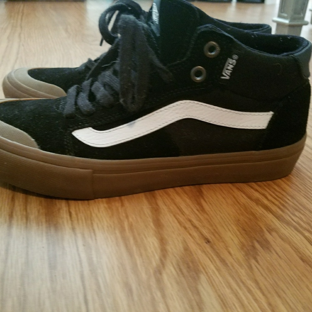 Vans size 8 MID top .. excellent condition